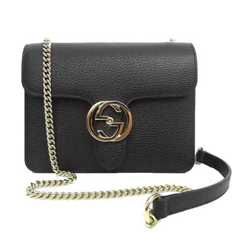 Medium GG crossbody bag with tag in black leather 